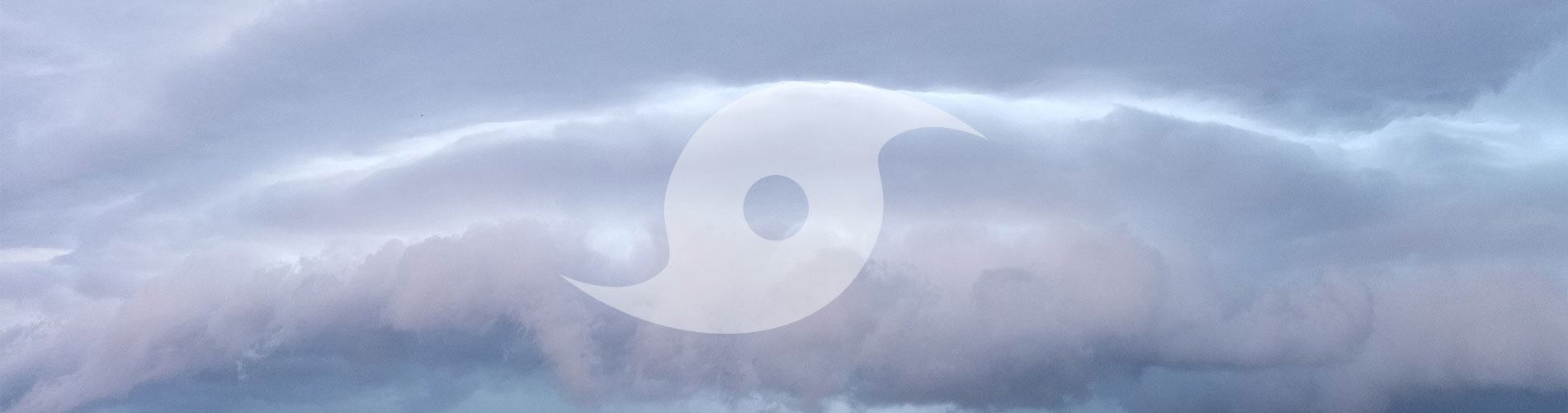 A hurricane symbol over a storm cloud.