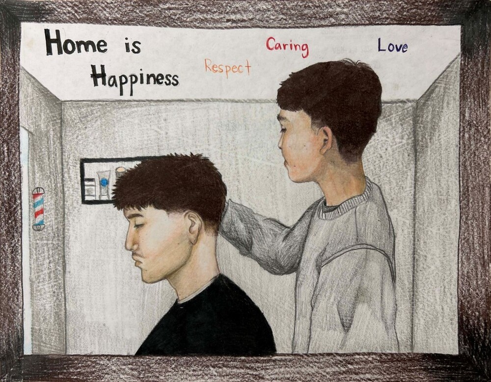What Home Means to Me 2026 winner. A barber giving another mana haircut in a barbershop. Home is respect. Caring. Love.