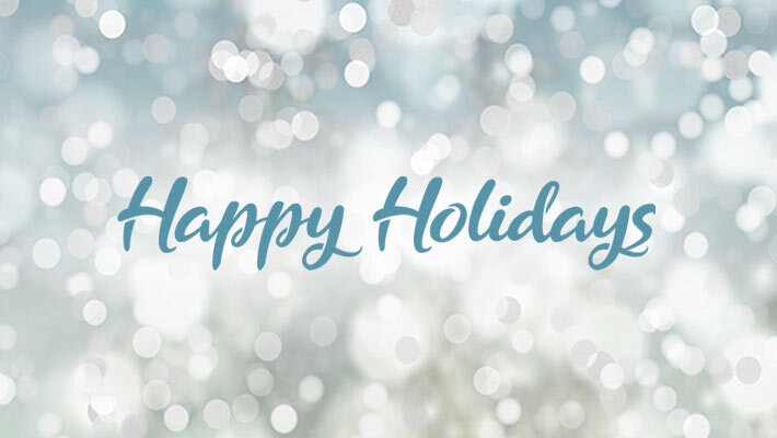 A background of snowflakes with the words" Happy Holidays".